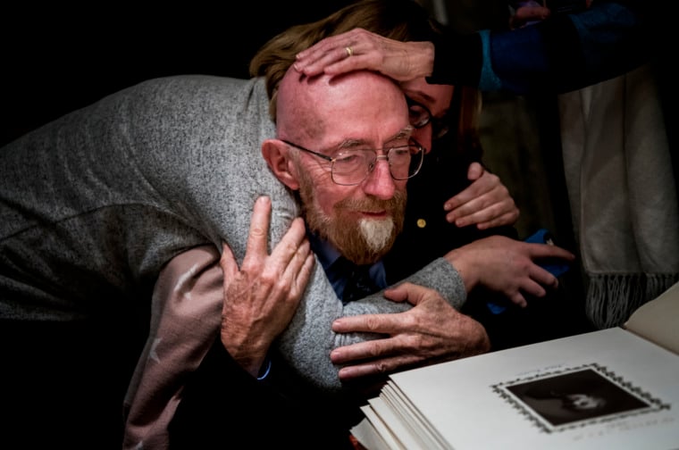 Kip Thorne at the Nobel Foundation reading the guestbook
